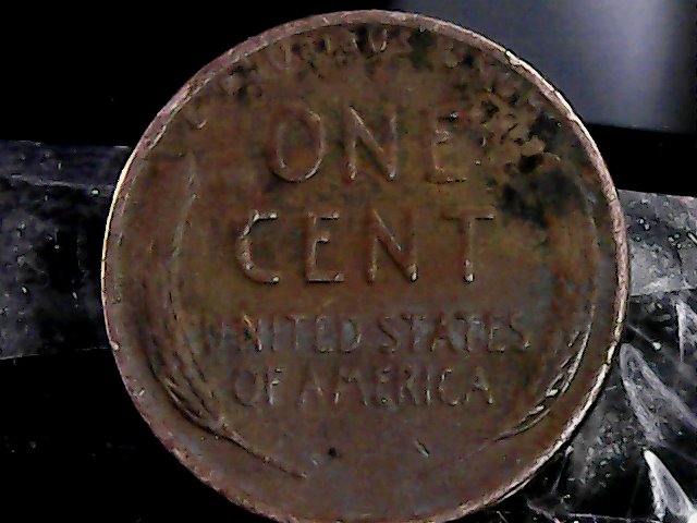 1952-S-Wheat-Penny-Stamped-On-Top-Of-Another-Coin-Or-Something-Please-Help